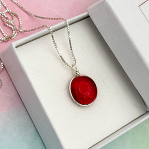 Collier Pendentif en verre transparent couleur grenat - technique Murano